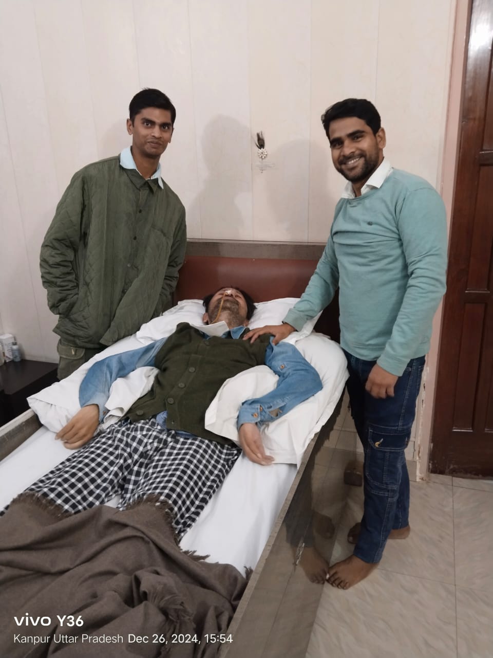 Nurse monitoring patient bedside